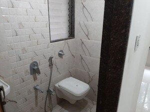 Bathroom in 3 BHK Apartment at Gemstar Symphony, Kandivali West – for Rent