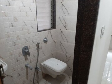 Bathroom in 3 BHK Apartment at Gemstar Symphony, Kandivali West – for Rent