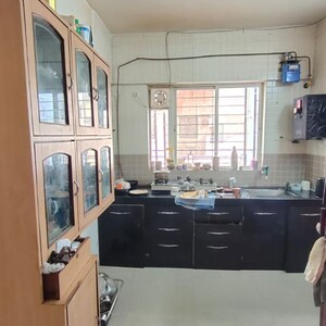 Kitchen in 2 BHK Apartment at Bhujbal Township, Bhusari Colony – for Rent