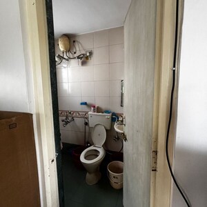 Bathroom in 2 BHK Apartment at Rohan Prarthana, Dahanukar Colony – for Rent