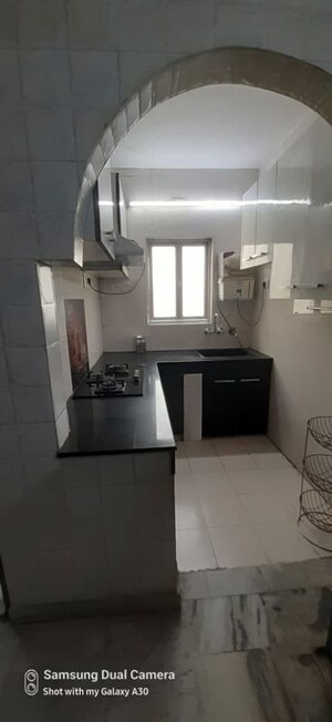 Kitchen in 2 BHK Apartment at Jungpura Extension – for Sale