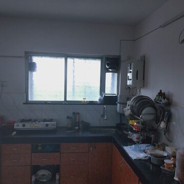 Kitchen in 2 BHK Apartment at Paranjape Lotus Court, Madhav Baug – for Rent