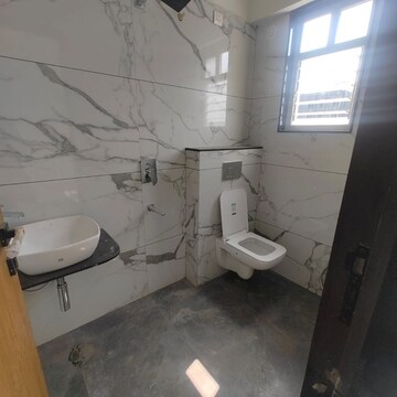 Bathroom in 2 BHK Apartment at Goel Ganga Legend, Sidhart Nagar – for Rent