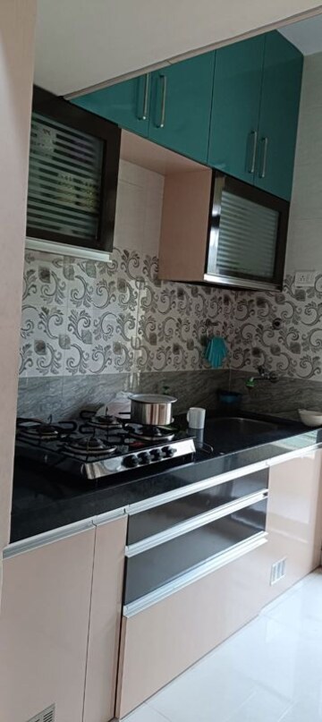 Kitchen in 2 BHK Apartment at Happy Home Sarvodaya Nagar, Ambernath West – for Rent