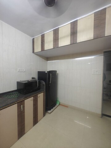 Kitchen in 2 BHK Apartment at Sea Breeze Tower, Nerul – for Rent