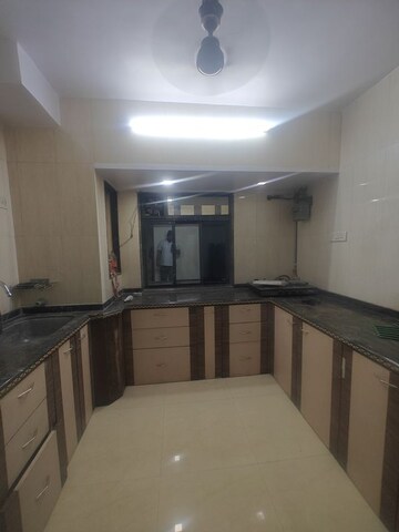 Kitchen in 2 BHK Apartment at Sea Breeze Tower, Nerul – for Rent