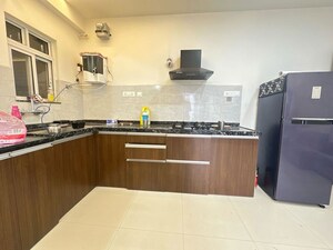 Kitchen in 2 BHK Apartment at Gera World of Joy, Kharadi – for Rent