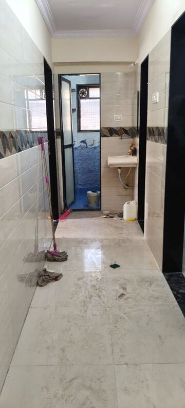 Building Lobby in 2 BHK Apartment at Air India Colony, Nerul – for Rent