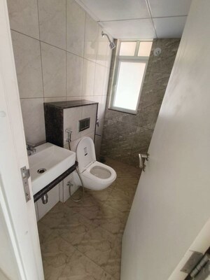 Bathroom in 2 BHK Apartment at Godrej Green Vistas, Mahalunge – for Rent