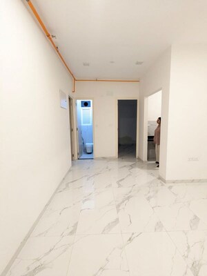 Building Lobby in 2 BHK Apartment at Ruparel Sky Green, Kandivali West – for Sale