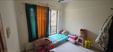 Bedroom in 2 BHK Apartment at Prism Enclave, Kandivali East – for Sale