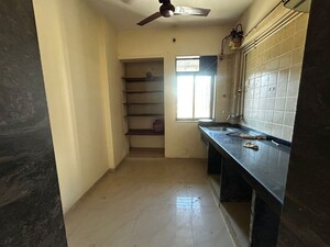 Kitchen in 2 BHK Apartment at Puranik Aarambh, Ghodbunder Road – for Sale