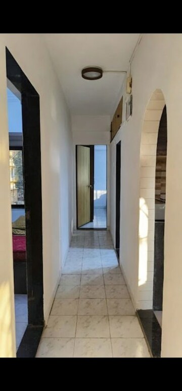 Building Lobby in 2 BHK Apartment at Karachi Citizens CHS, Juhu – for Rent