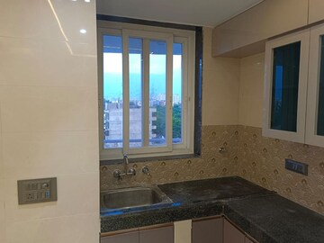 Kitchen in 4 BHK Apartment at DLF Park Place, Sector 54 – for Sale