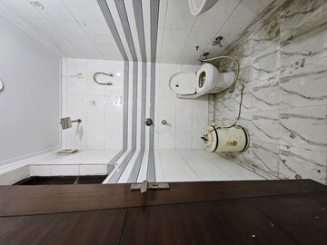 Bathroom in 4 BHK Builder Floor at Green Fields Colony – for Rent