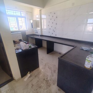 Kitchen in 3 BHK Apartment at Jhamtani Vision Ace Phase 1, Tathawade – for Rent