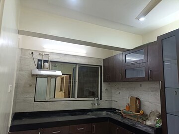 Kitchen in 2.5 BHK Apartment at GK Dwarka Flora Residency, Pimple Saudagar – for Sale