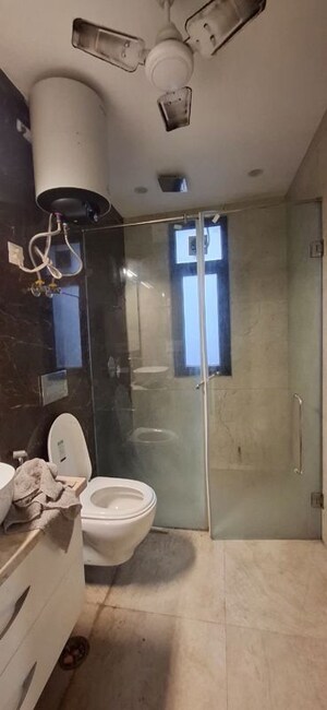 Bathroom in 3 BHK Builder Floor at Defence Colony – for Rent