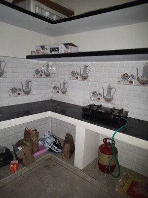 Master Bedroom in 1.5 BHK Builder Floor at RWA Apartments Sector 19, Sector 19 – for Rent