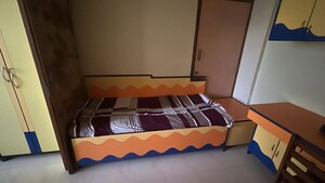 Bedroom in 2.5 BHK Apartment at Zalawad Darshan CHS, Andheri West – for Rent