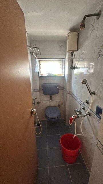 Bathroom in 2.5 BHK Apartment at Zalawad Darshan CHS, Andheri West – for Rent