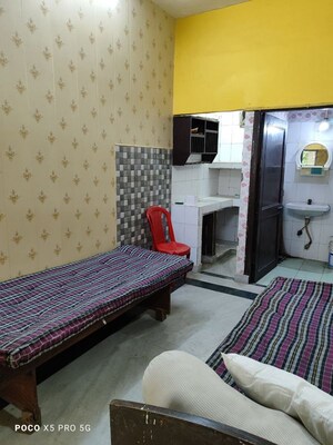 Bedroom in 1 RK Apartment at Arun Vihar Sector 37, Sector 37 – for Rent