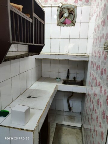 Kitchen in 1 RK Apartment at Arun Vihar Sector 37, Sector 37 – for Rent