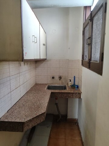 Kitchen in Studio Apartment at RWA Apartments, Sector 31 – for Rent