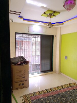 Bedroom in 1 BHK Apartment at Heramb Heights, Kalwa – for Rent