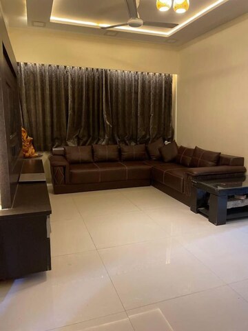 Living Room in 2 BHK Apartment at Lalani Grandeur, Goregaon East – for Rent