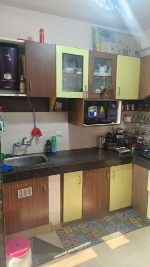 Kitchen in 2 BHK Apartment at Raj Nagar Extension – for Sale