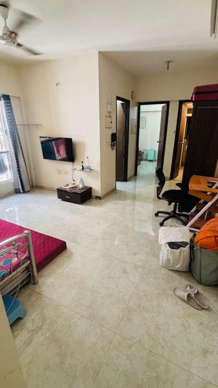 Living Room, lodha-amara-tower-44 1 Bedroom 472 Sq.Ft. Apartment In Kolshet Road Thane 10068404