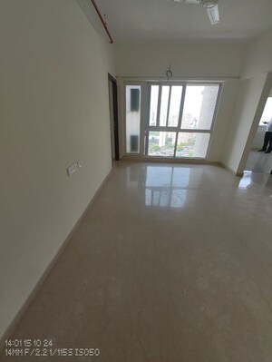 Room in 2 BHK Apartment at Omkar Signet, Malad East – for Rent