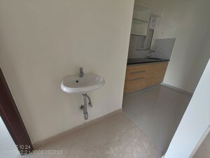 Bathroom in 2 BHK Apartment at Omkar Signet, Malad East – for Rent