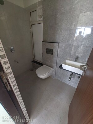 Bathroom in 2 BHK Apartment at Omkar Signet, Malad East – for Rent