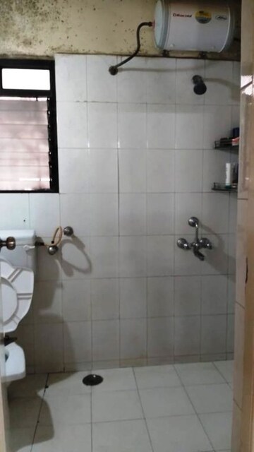 Bathroom in 2 BHK Apartment at Happy Colony – for Rent