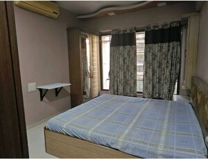Bedroom in 3 BHK Apartment at Laxmi Raajvilas, Goregaon West – for Rent
