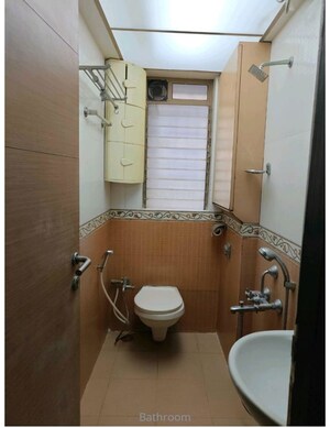 Bathroom in 3 BHK Apartment at Laxmi Raajvilas, Goregaon West – for Rent
