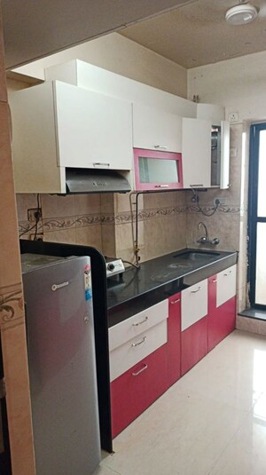 Kitchen in 3 BHK Apartment at K Raheja Heights, Malad East – for Rent
