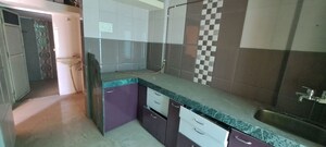 Kitchen in 1.5 BHK Apartment at Yamuna Malhari Ghorpade Arcade, Badlapur East – for Rent