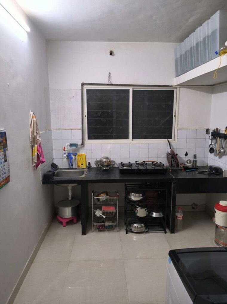 Kitchen, wadgaon sheri 1 Bedroom 586 Sq.Ft. Apartment In Wadgaon Sheri Pune 10068819