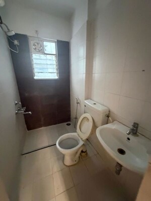 Bathroom in 2 BHK Apartment at Dwarkadheesh Residency, Pimple Saudagar – for Rent