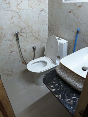 Bathroom in 3 BHK Apartment at Delhi Blue Apartments, Sarojini Nagar – for Rent