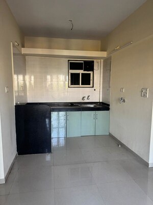 Kitchen in 2 BHK Apartment at Sai Ambience & Sai Vision, Pimple Saudagar – for Rent