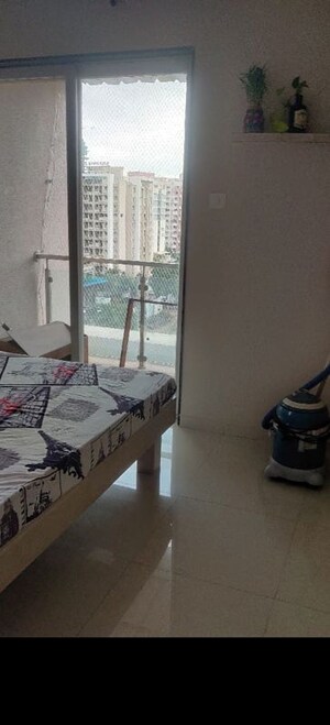 Room in 2 BHK Apartment at Magnova Manor, Wakad – for Sale