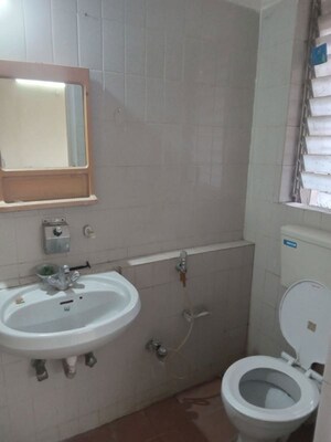Bathroom in 1 BHK Apartment at Lokhandwala Whispering Palms, Kandivali East – for Rent
