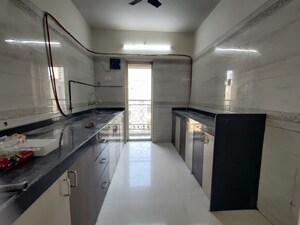 Kitchen in 2 BHK Apartment at Rosa Oasis, Thane West – for Rent