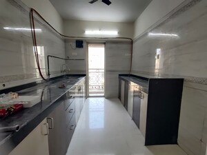 Kitchen in 2 BHK Apartment at Rosa Oasis, Thane West – for Rent