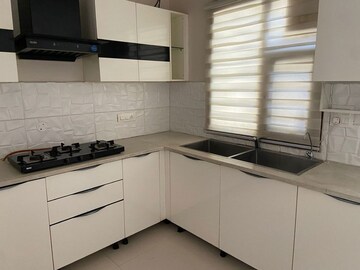 Kitchen in 3 BHK Builder Floor at Sunny Enclave – for Sale