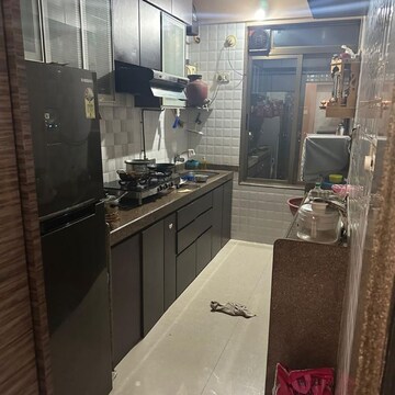 Kitchen in 2 BHK Apartment at Gurukrupa Raj Hills, Khande Rao Dongari – for Rent